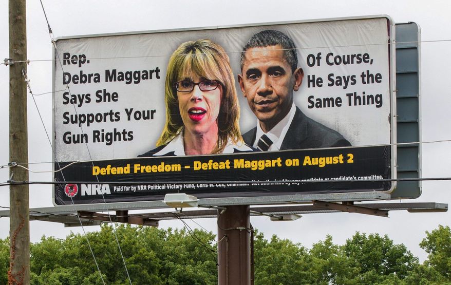 An NRA billboard in Hendersonville, Tenn., attacks state Rep. Debra Maggart. The group has had a falling out with Republican lawmakers in Tennessee over a bill seeking to guarantee workers the right to store their guns in their cars while at work. (Associated Press)