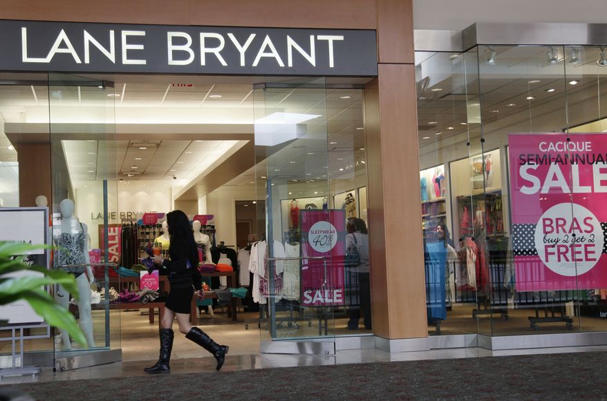 A shopper walks into a Lane Bryant store in San Jose, Calif., on Friday, June 15, 2012. (AP Photo/Paul Sakuma)