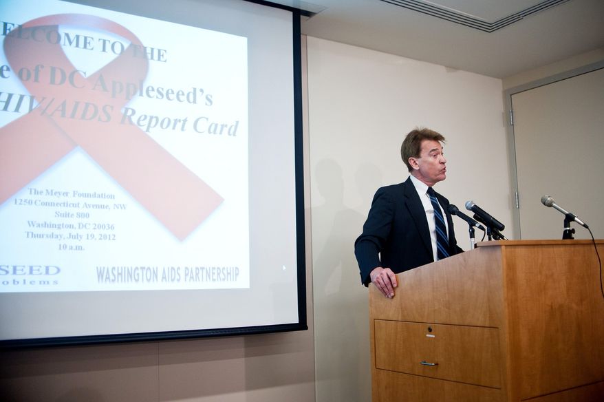 Walter Smith, Executive Director of D.C. Appleseed, speaks during a press conference organized by D.C. Appleseed and The Meyer Foundation, Washington D.C., Thursday, July 19, 2012. The press conference was held to address the findings of the seventh HIV/AIDS Report Card put out by D.C. Appleseed. (Ryan M.L. Young/The Washington Times)