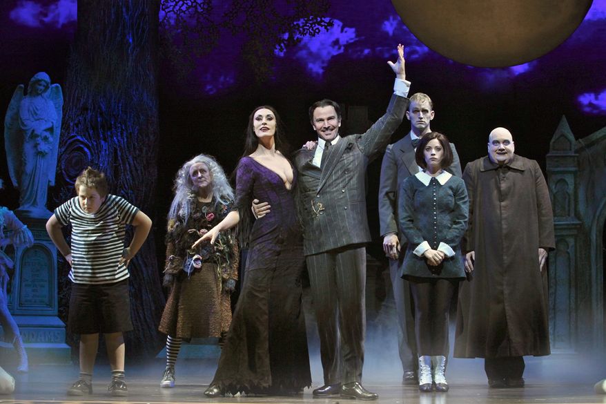 The key to a successful staging of "The Addams Family" is taking concrete characters and putting them in a foreign land. Marshall Brickman and Rick Elice did exactly that in the production playing at the Kennedy Center.