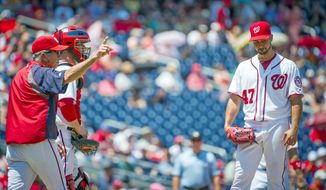 Davey Johnson gives Gio Gonzalez an early hook after the Nationals left-hander gave up six earned runs in 3.1 innings, his shortest start of the season. The Mets rolled to a 9-5 win at Nationals Park. (Rod Lamkey Jr./The Washington Times)