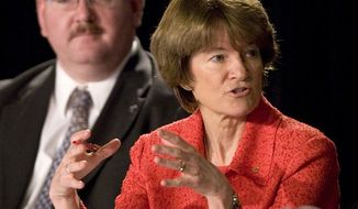 ** FILE ** In this July 28, 2009 photo, former astronaut Dr. Sally Ride, with Jeffrey Greason in the background, comments during a meeting of the Review of U.S. Human Space Flight Plans Committee. Ride, the first American woman in space, died Monday, July 23, 2012 after a 17-month battle with pancreatic cancer. She was 61. (AP Photo/Houston Chronicle, Brett Coomer, File)