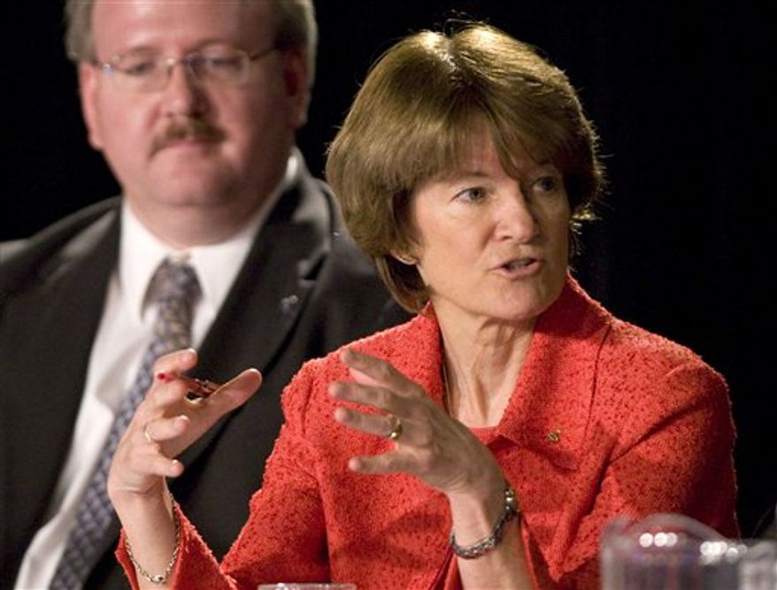 ** FILE ** In this July 28, 2009 photo, former astronaut Dr. Sally Ride, with Jeffrey Greason in the background, comments during a meeting of the Review of U.S. Human Space Flight Plans Committee. Ride, the first American woman in space, died Monday, July 23, 2012 after a 17-month battle with pancreatic cancer. She was 61. (AP Photo/Houston Chronicle, Brett Coomer, File)