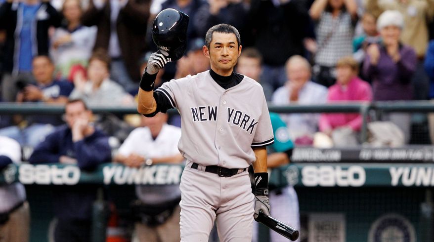 ASSOCIATED PRESS
Outfielder Ichiro Suzuki acknowledges cheers from Mariners fans Monday night during his first game as a New York Yankee after 11-plus seasons in Seattle.