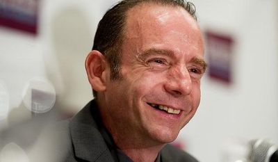 Timothy Ray Brown, the man believed to be the only known patient completely cured of the AIDS virus, speaks July 24, 2012, at a press conference at the Westin City Center in Washington, D.C., during the the biennial international AIDS conference. (Andrew Harnik/The Washington Times)