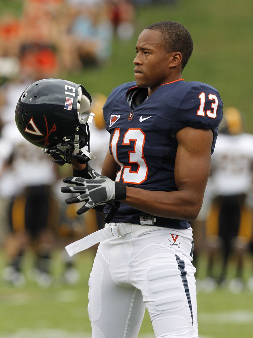 An injury "setback" has caused the Redskins to waive former Virginia cornerback Chase Minnifield. (AP Photo/Steve Helber)