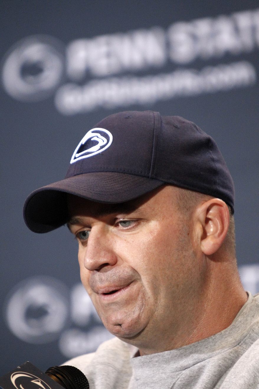 FILE - This April 21, 2012 file photo shows Penn State head coach Bill O'Brien during a news conference after the NCAA football team's annual Blue White spring scrimmage, in State College, Pa. O'Brien says his priority right now is to try to convince his current players from transferring. (AP Photo/Keith Srakocic, File)