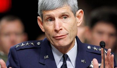 Air Force Chief of Staff Gen. Norton Schwartz, testifies on Capitol Hill in Washington Friday, Dec. 3, 2010, before the Senate Armed Service Committee hearing on the military Don’t Ask Don’t Tell policy. (AP Photo/Alex Brandon)