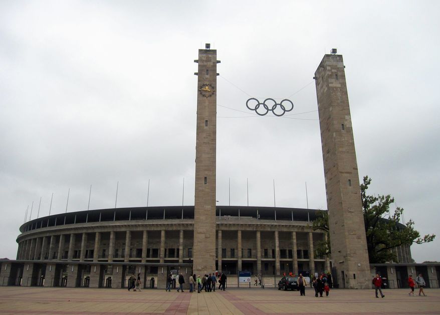 This Sept. 25, 2010 photo shows the Olympic rings on the approach to Olympiastadion Berlin, where U.S. gold medalist Jesse Owens won four gold medals during the 1936 Summer Olympics in Berlin. Germany hosted two notorious games: The 1936 Berlin Olympics, which Adolf Hitler tried to turn into a showcase of Aryan supremacy, and the 1972 Munich Olympics, married by a hostage crisis that left 11 Israelis dead. (Associeted Press)