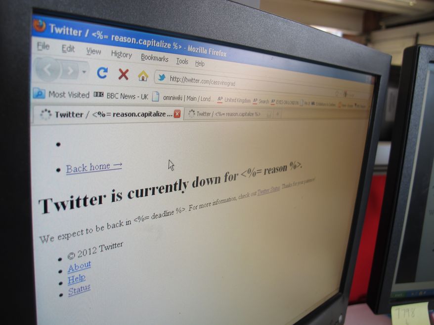 **FILE** A computer screen displaying the the micro-blogging site Twitter is seen July 26, 2012, in London. Users across the United States, Europe and Africa reported outages or sluggishness on the day before the London 2012 Games are expected to cause a spike in activity on the site. (Associated Press)