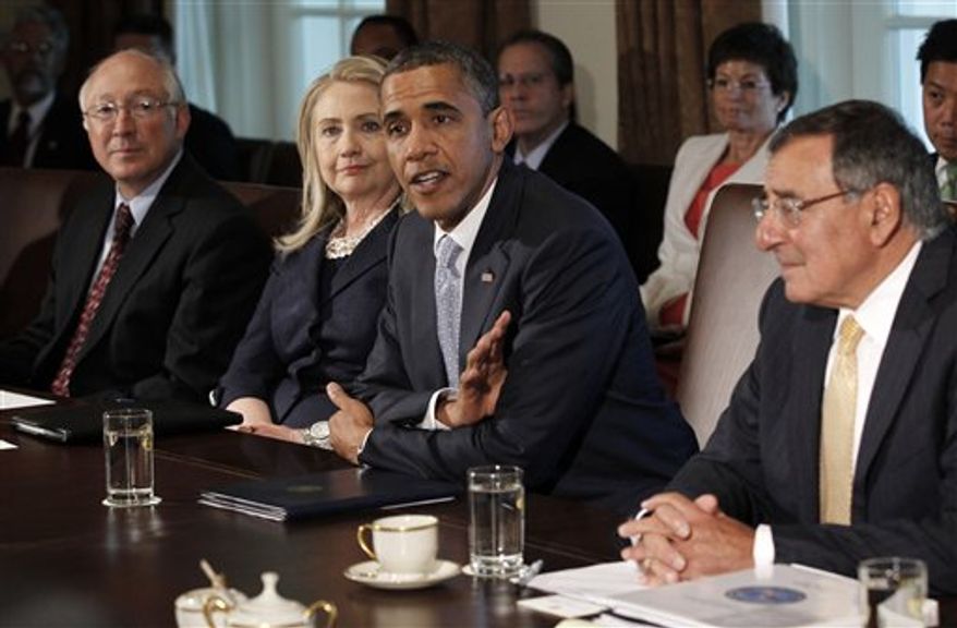 President Obama meets with members of his cabinet in the Cabinet Room of the White House, Thursday, July, 26, 2012. From left are, Interior Secretary Ken Salazar, Secreatry of State Hillary Rodham Clinton, the president and Defense Secretary Leon Panetta. (AP Photo/Pablo Martinez Monsivais)