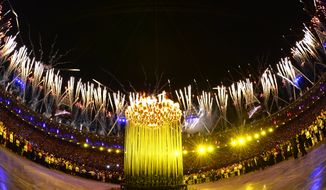 The closing ceremony of the 2012 Olympics will be streamed live online. Here are fireworks illuminating the sky after the Olympic cauldron was lit during the opening ceremony Saturday, July 28, 2012, in London.  (AP Photo/Leon Neal, Pool)