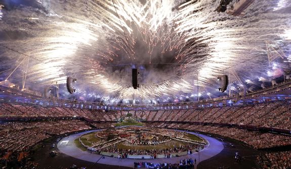 Fireworks explode during the Opening Ceremony at the 2012 Summer Olympics, Friday, July 27, 2012, in London. (AP Photo/Paul Sancya)