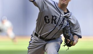 Washington Nationals&#39; Jordan Zimmermann pitches against the Milwaukee Brewers during the first inning of a baseball game Saturday, July 28, 2012, in Milwaukee. (AP Photo/Jim Prisching)