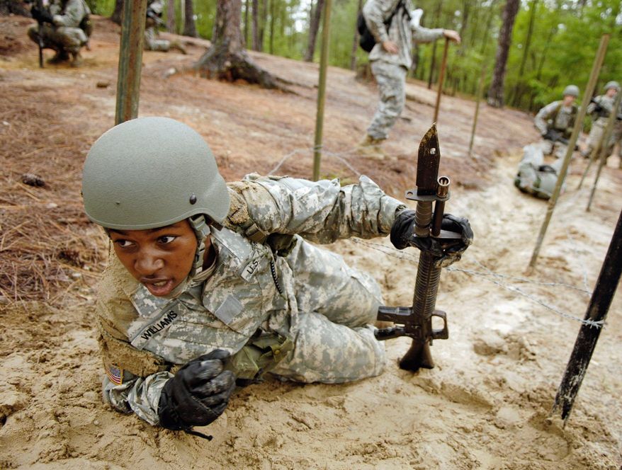 A U.S. Army recruit negotiates the confidence course during the white phase of basic combat training at Fort Jackson, S.C., on June 14, 2006. The training lasts nine weeks and is divided into red, white and blue phases. Soldiers in the white phase are in their final three weeks. (Department of Defense/Staff Sgt. Stacy L. Pearsall, U.S. Air Force)