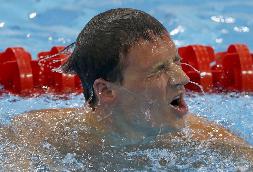 United States' Ryan Lochte reacts after competing in the men's 200-meter freestyle swimming final in the 2012 London Olympics at the Aquatics Centre in the Olympic Park on Monday, July 30, 2012. (AP Photo/Daniel Ochoa De Olza)