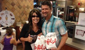 Former Alaska Gov. Sarah Palin at Chick-fil-A in the Woodlands, Texas, with her husband Todd Palin. (Facebook)
