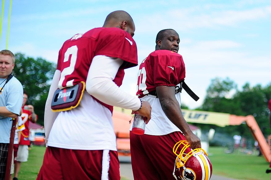 London Fletcher (#59) takes the field during Redskins' training camp at Redskins Park, Ashburn, Va., Monday, July 30, 2012. (Ryan M.L. Young/The Washington Times)