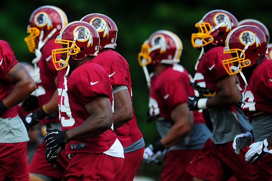London Fletcher (#59) warms up during Redskins' training camp at Redskins Park, Ashburn, Va., Monday, July 30, 2012. (Ryan M.L. Young/The Washington Times)