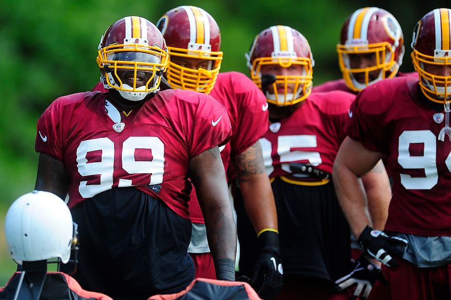 Jarvis Jenkins (#99) participates in drills during Redskins' training camp at Redskins Park, Ashburn, Va., Monday, July 30, 2012. (Ryan M.L. Young/The Washington Times)