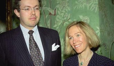 **FILE** Eva Rausing (right) and husband Hans Kristian Rausing attend Nov. 26, 1996, the Glamour America Fashion Show and lunch at Winfield House, London, the residence of the U.S. ambassador to the U.K. (Associated Press/Alan Davidson/The Picture Library Ltd)