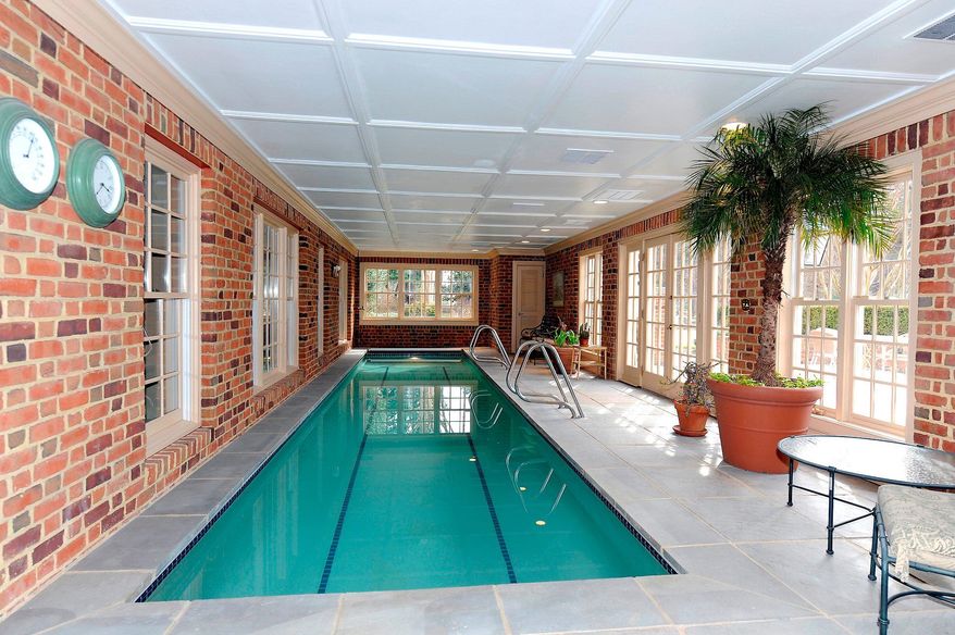 The enclosed patio holds a 10-by-40-foot lap pool with a retractable cover that can be used year-round.