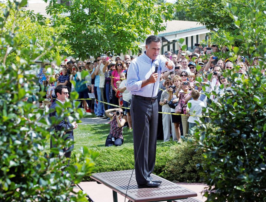 Mitt Romney, the presumptive Republican presidential nominee, addresses an overflow crowd as he campaigns with his Plan for a Stronger Middle Class at the Jefferson County Fairgrounds in Golden, Colo., on Thursday. (Associated Press)