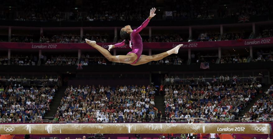 U.S. gymnast Gabrielle Douglas performs Aug. 2, 2012, on the balance beam during the artistic gymnastics women's individual all-around competition at the 2012 Summer Olympics in London. (Associated Press)