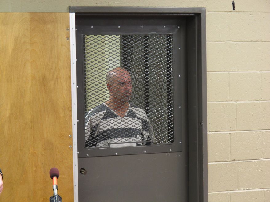 Donald Foster III, 49, listens Aug. 2, 2012, to a judge during his bond hearing in Lexington, S.C. Foster was charged with attempted murder for pouring bleach into water tanks used by kidney dialysis machines at a kidney dialysis center after the center suspended him from his job as an equipment technician and patient care technician, investigators said. (Associated Press)