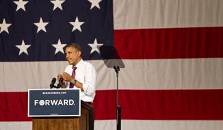 President Obama addresses the crowd of supporters on his grass-roots campaign tour at the Harold and Ted Alfond Sports Center of Rollins College in Winter Park, Fla., on Thursday, Aug. 2, 2012. (AP Photo/Tampa Bay Times, Willie J. Allen Jr.) 