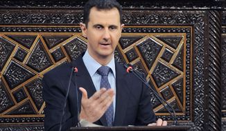 ** FILE ** Syrian President Bashar Assad delivers a speech on Sunday, June 3, 2012, at the parliament in Damascus, Syria. (Associated Press/SANA)