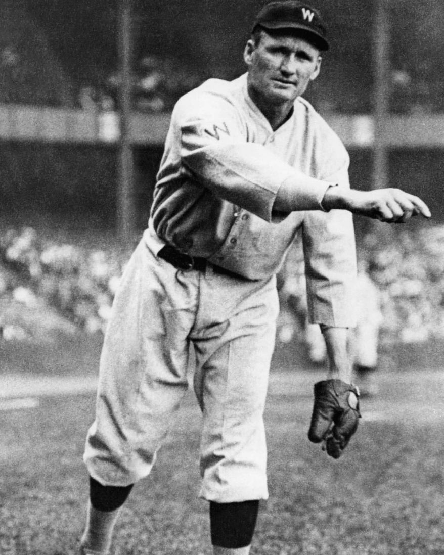 Walter Johnson, nicknamed "The Big Train," was a pitcher playing from 1907 to 1927 with the Washington Senators. Johnson was known as a power pitcher of his era, believed to throw the ball over 100 miles per hour. Later in Johnson's career as baseball manager he had the nickname, "Old Barney." Location and date of this photo is unknown. (AP Photo)