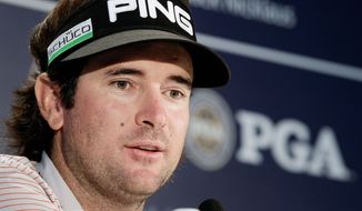 Bubba Watson answers questions in the interview room at the PGA Championship golf tournament on the Ocean Course of the Kiawah Island Golf Club in Kiawah Island, S.C., Tuesday, Aug. 7, 2012. (AP Photo/Chuck Burton)