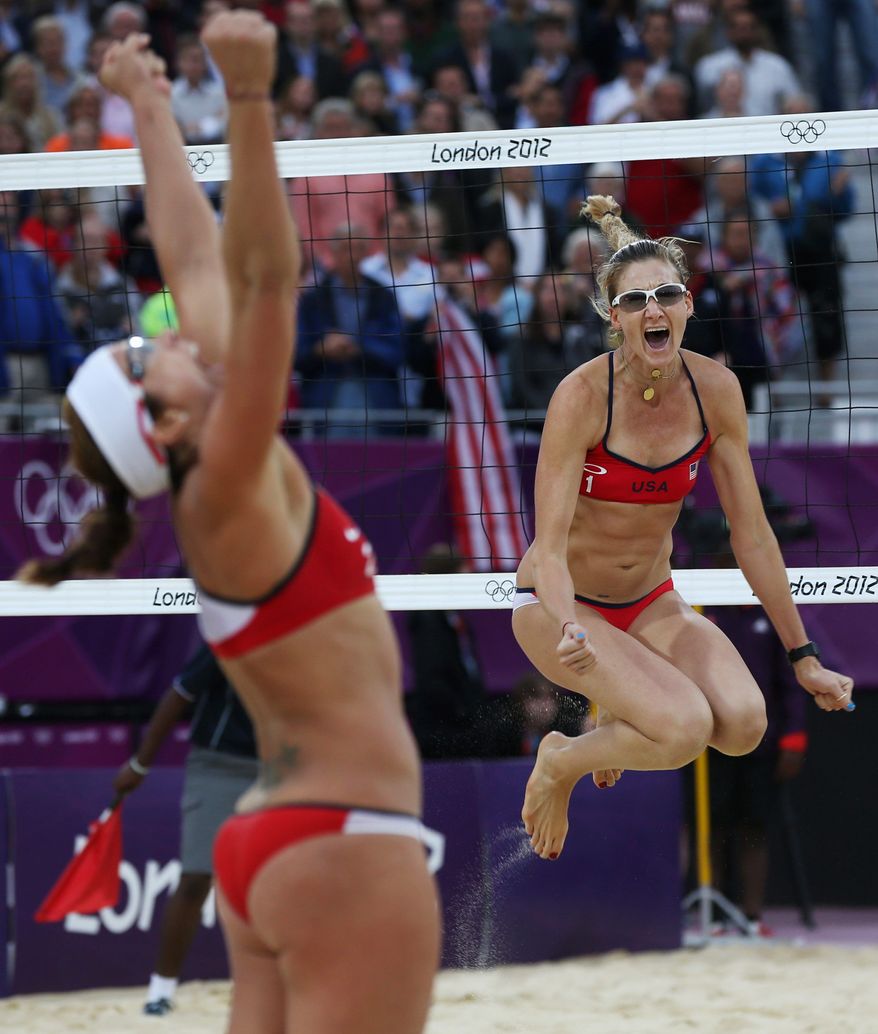 associated press
Misty May-Treanor and Kerri Walsh Jennings celebrate their win in the Olympic semifinals Tuesday. They will face fellow Americans April Ross and Jennifer Kessy in the gold medal match Wednesday.