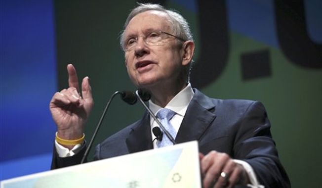 ** FILE ** U.S. Sen. Harry Reid, Nevada Democrat, speaks at the National Clean Energy Summit at the Bellagio in Las Vegas on Tuesday, Aug. 7, 2012. (AP Photo/Las Vegas Review-Journal, Jessica Ebelhar)