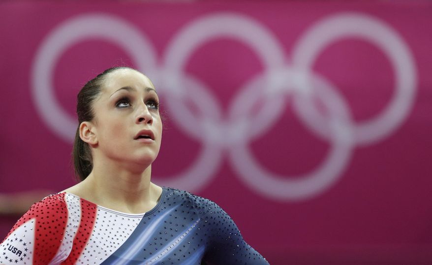 U.S. gymnast Jordyn Wieber looks at the scoreboard after performing during the artistic gymnastics women's floor exercise final at the 2012 Summer Olympics, Tuesday Aug. 7, 2012, in London. (AP Photo/Gregory Bull)