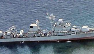 The Chinese frigate Dongguan, “the bully that ran aground” in the words of one Philippines official, was temporarily grounded near disputed Half Moon Shoal. (Philippines Government)