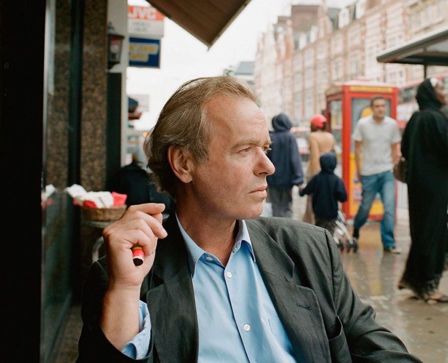 Author Martin Amis seems to reserve his trademark sneer for photo shoots. (Random House)