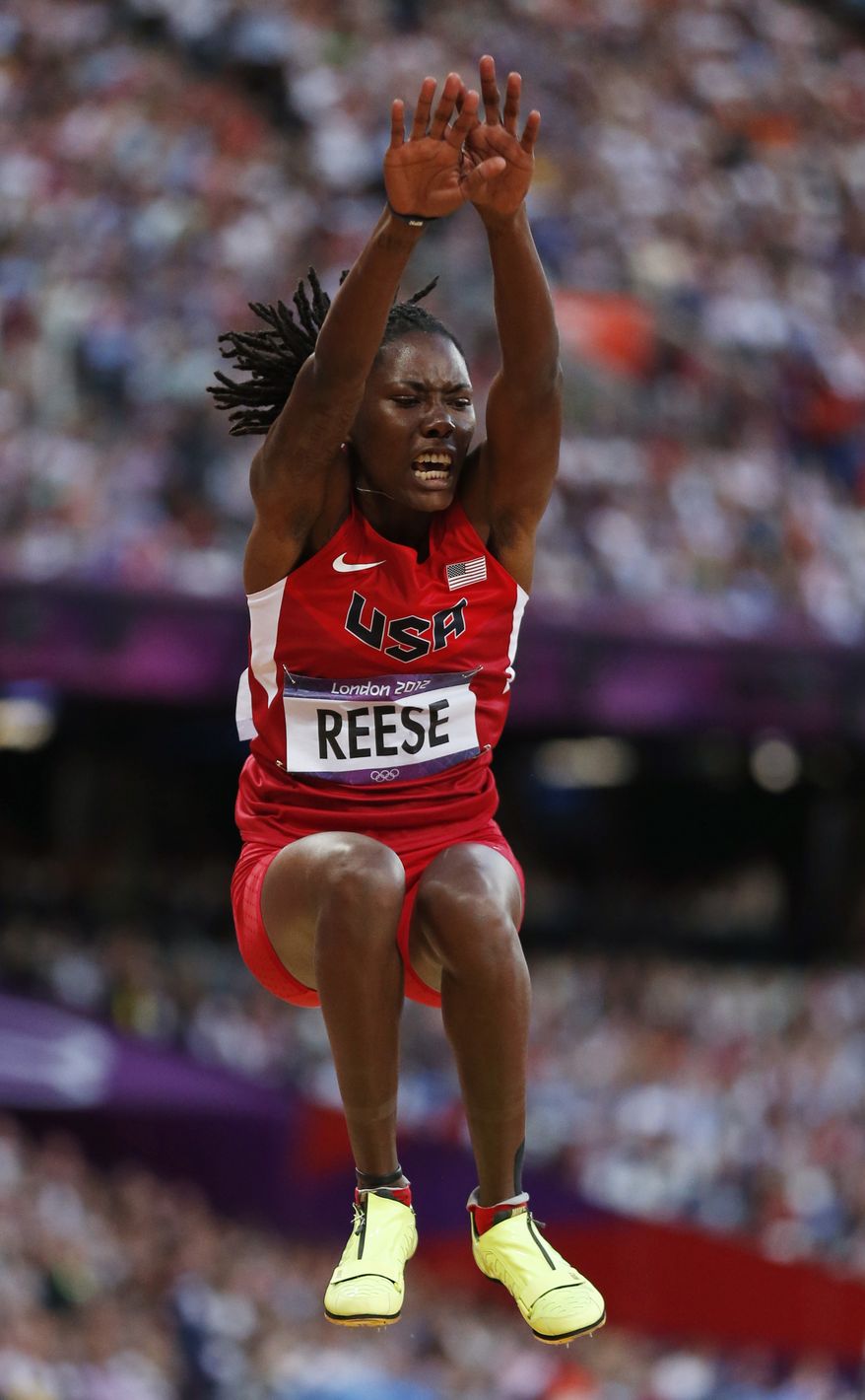 United States' Brittney Reese competes in the women's long jump final during the athletics in the Olympic Stadium at the 2012 Summer Olympics, London, Wednesday, Aug. 8, 2012. (AP Photo/Matt Dunham)