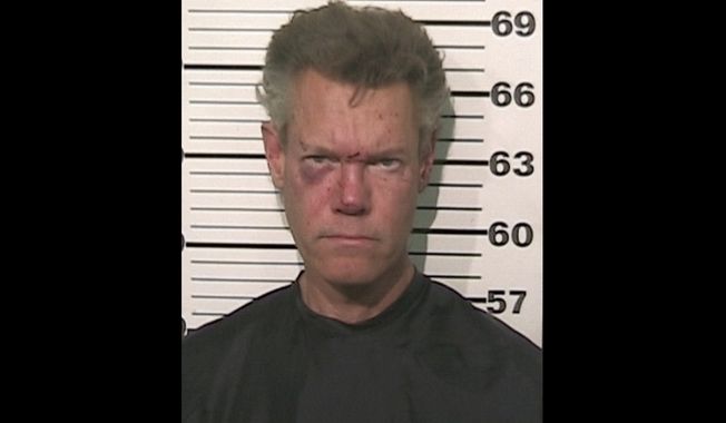 Country singer Randy Travis is pictured after being charged with driving while intoxicated near Tioga, Texas, late on Tuesday, Aug. 7, 2012. (AP Photo/Grayson County Sheriff&#x27;s Office)
