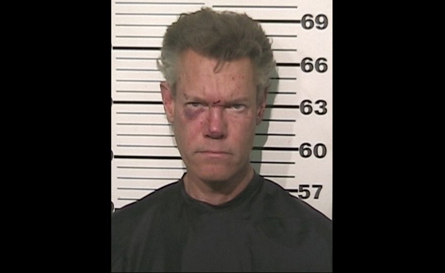 Country singer Randy Travis is pictured after being charged with driving while intoxicated near Tioga, Texas, late on Tuesday, Aug. 7, 2012. (AP Photo/Grayson County Sheriff's Office)