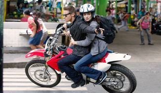 Jeremy Renner and Rachel Weisz are on the run from a crew of sleazy bureaucrats in “The Bourne Legacy.” Mr. Renner plays agent Aaron Cross in the latest Bourne film. (Universal Pictures via Associated Press)