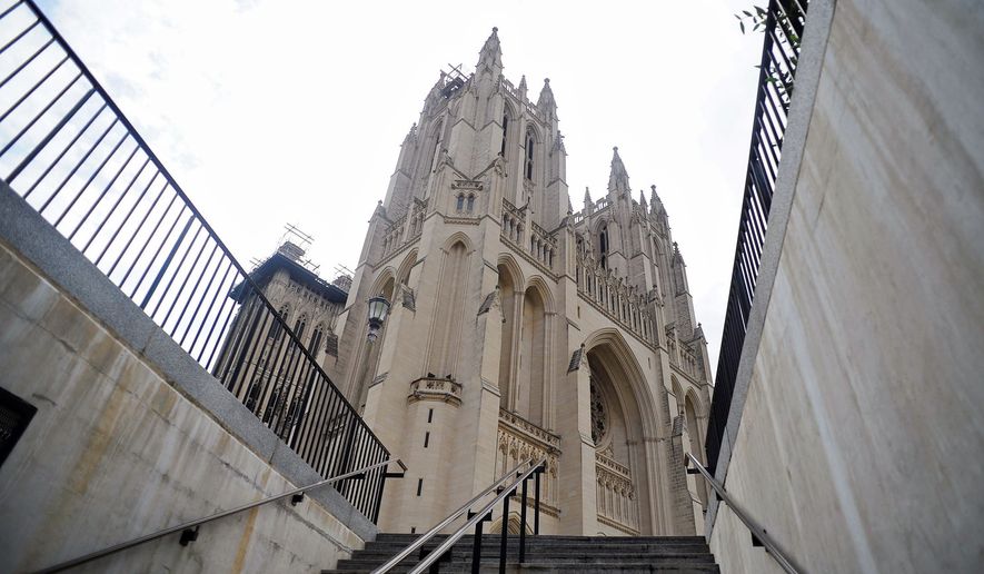 The Washington National Cathedral is viewed from the stairs leading up from its underground parking garage. Woodrow Wilson and his wife, Edith, are interred inside the cathedral, as are Helen Keller and Anne Sullivan. (Ryan M.L. Young/The Washington Times) ** FILE **