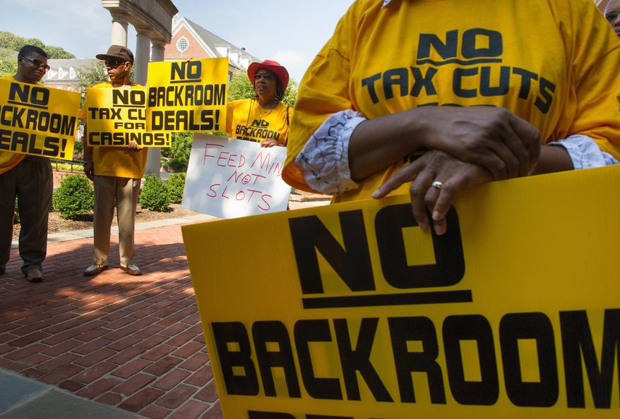 Residents of Prince George’s County stage a rally Thursday against legislation that would expand gambling in the state. Their objections appeared to fall on deaf ears as the Senate’s Budget and Taxation Committee gave the measure a green light. (Andrew Harnik/The Washington Times)