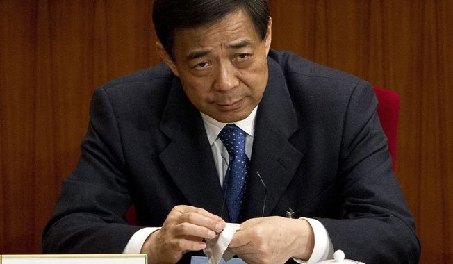 ** FILE ** Bo Xilai, then the Chongqing Communist Party secretary, attends a plenary session of the National People&#x27;s Congress at the Great Hall of the People in Beijing on Sunday, March 11, 2012. (Associated Press)