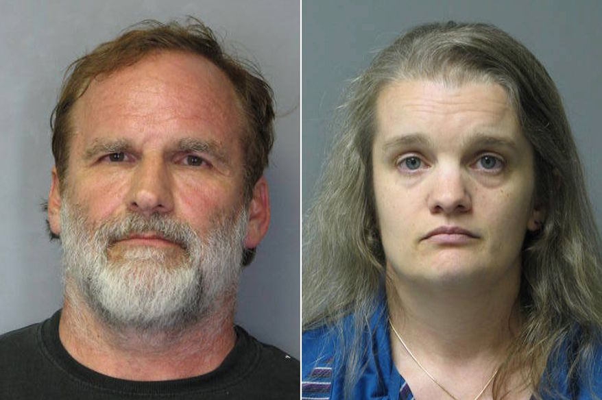 This combination of photos released by the Delaware State Police shows Georgetown pediatrician Melvin Morse, 48, left, and his wife, Pauline Morse, 40. The couple have been charged with recklessly endangering their two daughters, including the use of a form of discipline that police say the Melvin Morse called "waterboarding." They were arrested Aug. 9, 2012. (Associated Press/Delaware State Police)