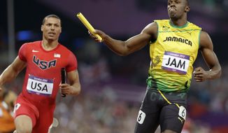 Jamaica&#39;s Usain Bolt leads United States&#39; Ryan Bailey to win the men&#39;s 4x100-meter relay final during the athletics in the Olympic Park during the 2012 Summer Olympics, Saturday, Aug. 11, 2012, in London. Jamaica set a new world record with a time of 36.84 seconds.(AP Photo/Anja Niedringhaus)

