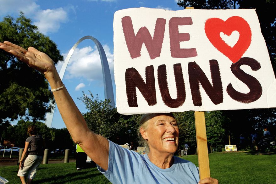 Pat Martens Balke of St. Louis rallies with other supporters of the Leadership Conference of Women Religious at a vigil Thursday in St. Louis. The LCWR is meeting to decide how they should respond to a Vatican rebuke. (Associated Press)