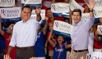 Mitt Romney (left), the presumptive Republican presidential nominee, and Rep. Paul Ryan, his running mate, arrive at a campaign rally in Mooresville, N.C., at the NASCAR Technical Institute on Sunday, Aug. 12, 2012. (Associated Press)