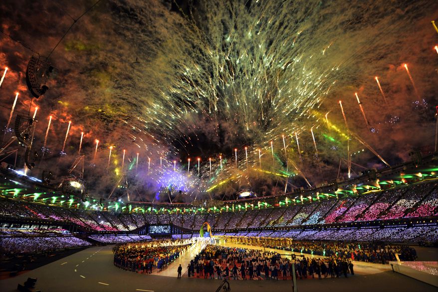 Fireworks explode over the stadium during the Closing Ceremony at the 2012 Summer Olympics, Sunday, Aug. 12, 2012, in London. (AP Photo/Martin Meissner)